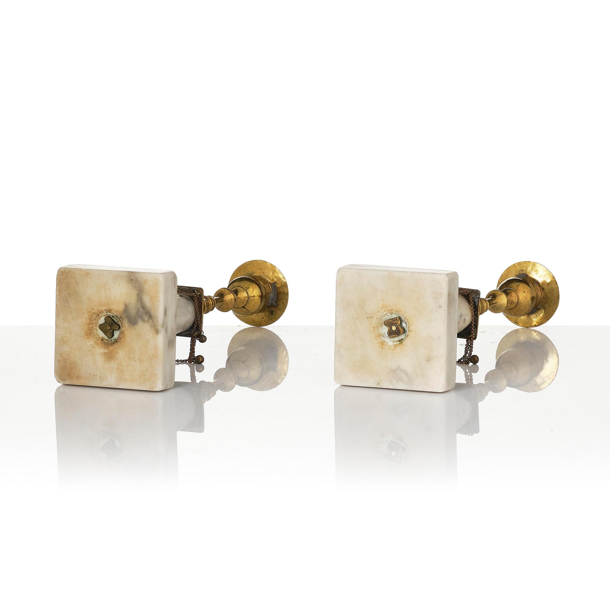 A pair of late Gustavian marble and gilt brass candlesticks, late 18th century.