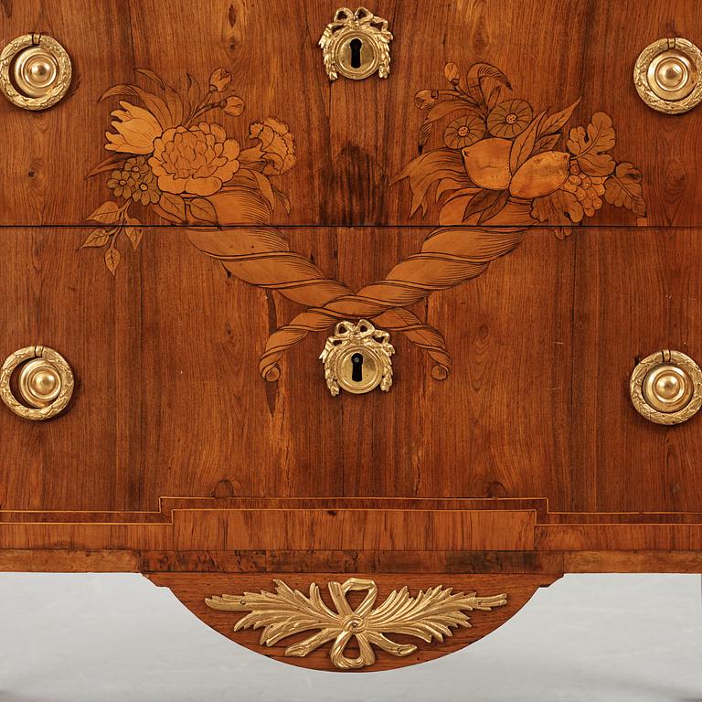 A Gustavian marquetry and gilt brass-mounted commode by G. Foltiern (master in Stockholm 1771-1804), dated 1782.