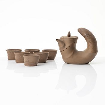A grey yixing 'bamboo shoot' teapot with six cups, China, 1980s.