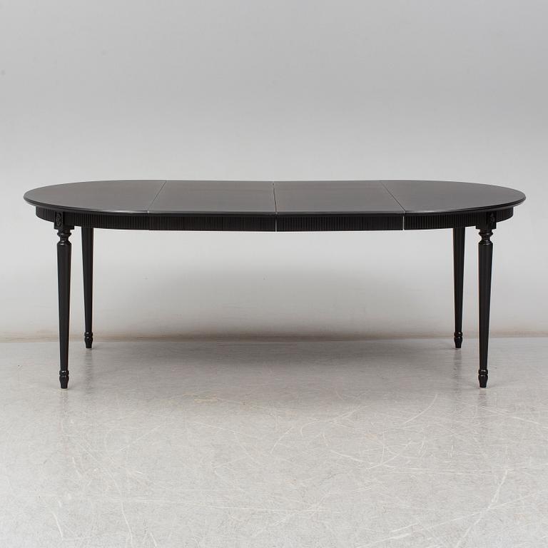 A gustavian style dining table, second half of the 20th century.