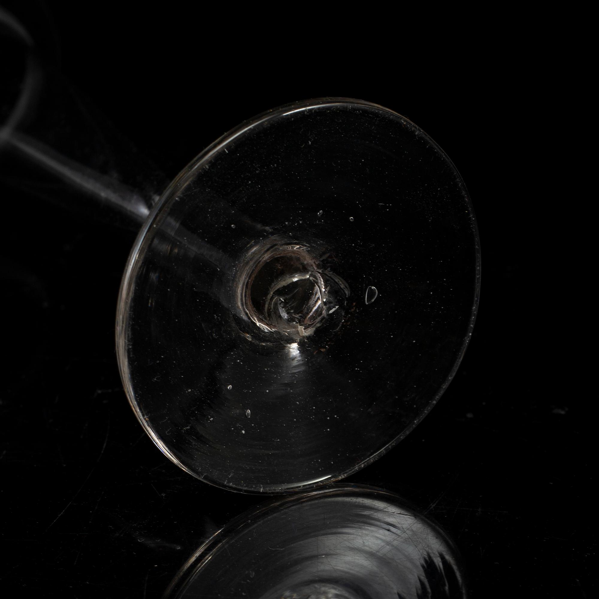 A group of six champagne glasses, circa 1800.