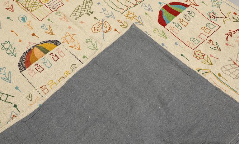 A hand-embroidered Kilim rug, c. 239 x 175 cm.