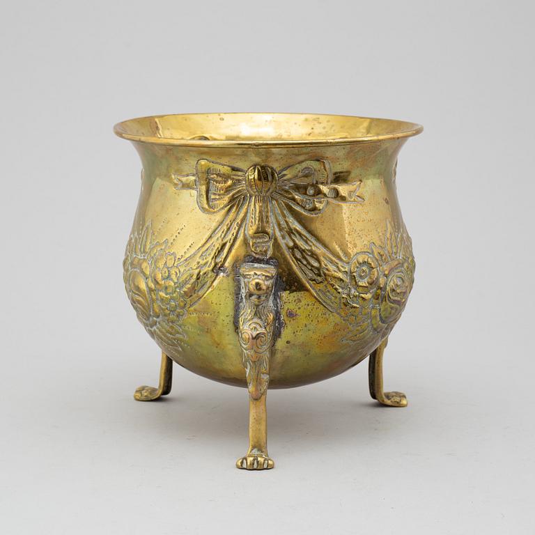 An 18th century brass flower pot.