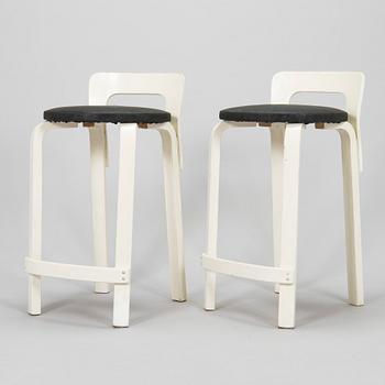 Alvar Aalto, a pair of late 20th century 'K65' bar stools for Artek.