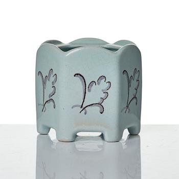 Wilhelm Kåge, eleven pieces of faience including jars, inkwells and a tulip vase, Gustavsberg, Sweden, 1919-1920.