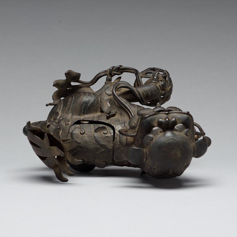 A bronze censer with cover in the shape of a Buddhist lion, Qing dynasty, 19th Century.