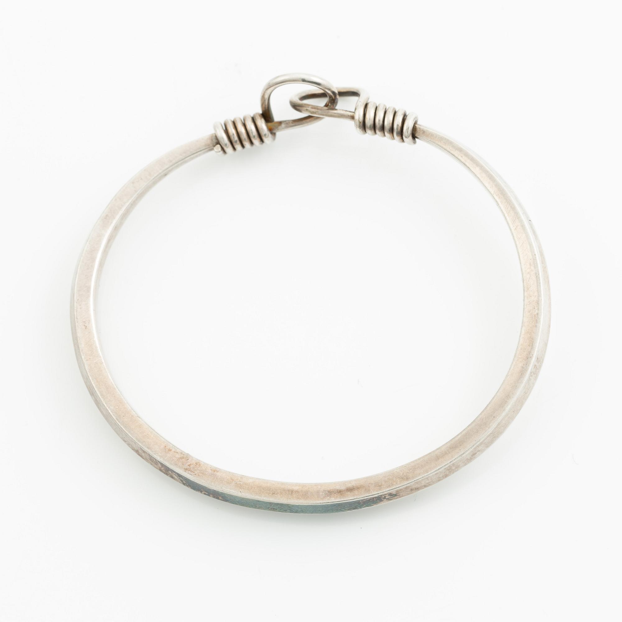 A bracelet and two pairs of earrings, silver, including E Ohlsson, Stockholm 1977.