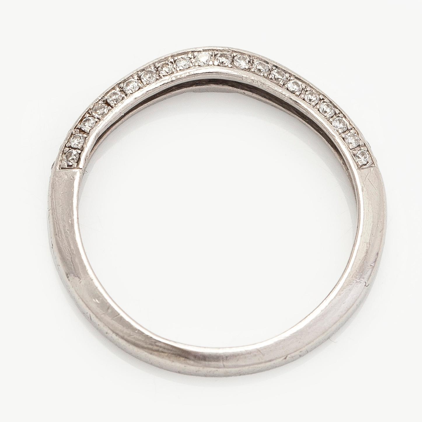 Ring, half eternity, platinum with diamonds.