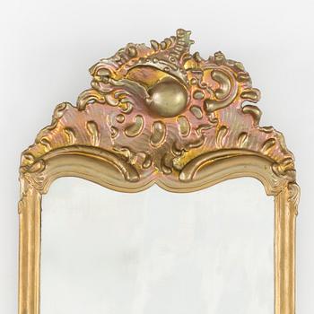 A rococo mirror, 18th century.