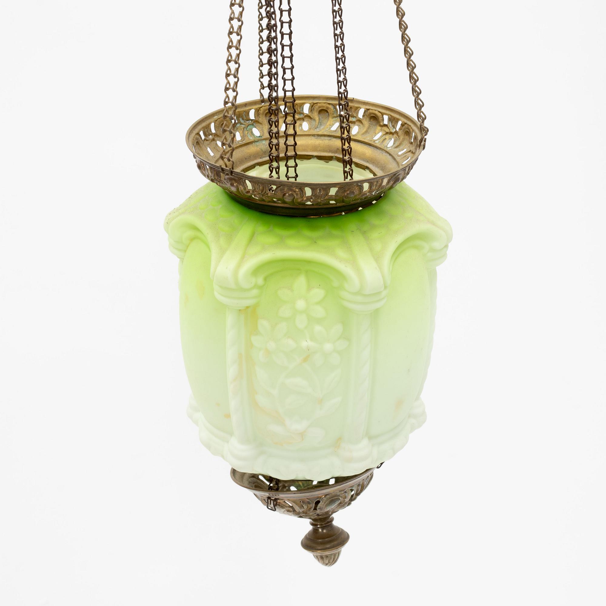 An art noveau glass and brass ceiling lamp from around the year 1900.