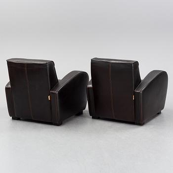 A pair of Italian leather armchairs from  Industria Divani e Poltrone, 21st-century.