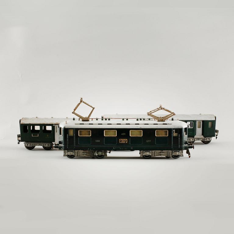 A 1940/50s model train set of 31 pcs in O-scale made by HAG, Switzerland.