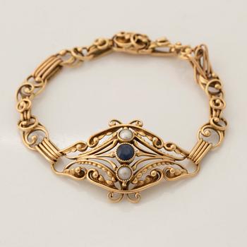 Gold, pearl and sapphire bracelet.