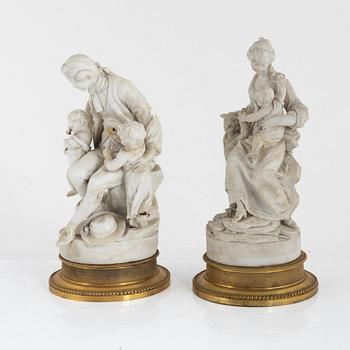 A pair of parian / bisuit porcelain groups, after J Gott, probably England 19th century.