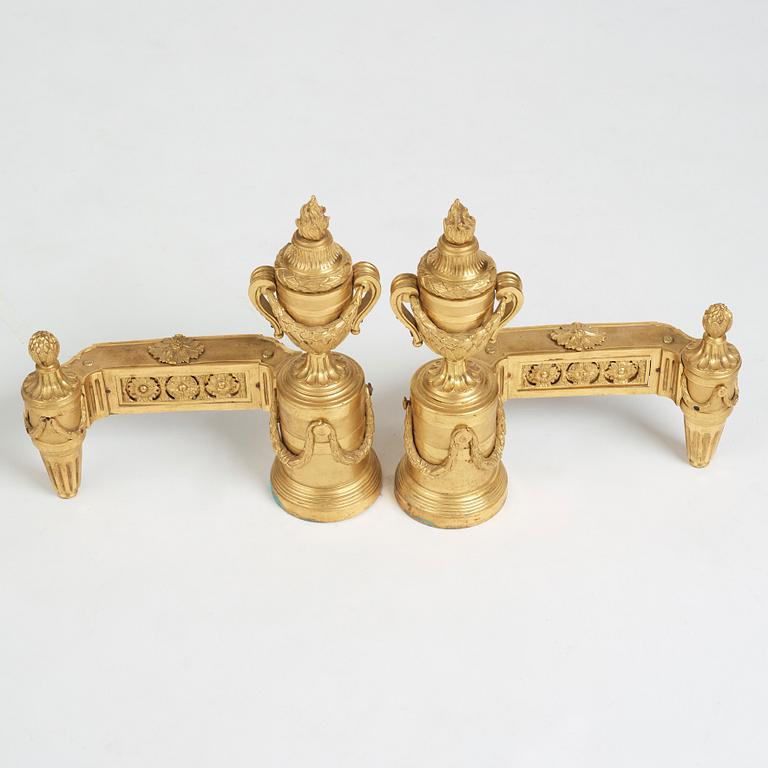 A pair of Louis XVI 18th Century bronze chenets.