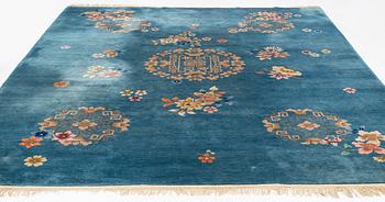 A Chinese carpet, 355 x 270 cm.