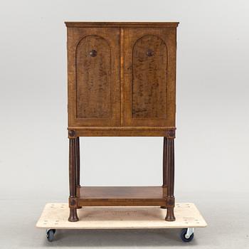 A stained birch cabinet, 1920's/30's.