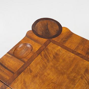 A rococo parquetry games table, later part of the 18th century.