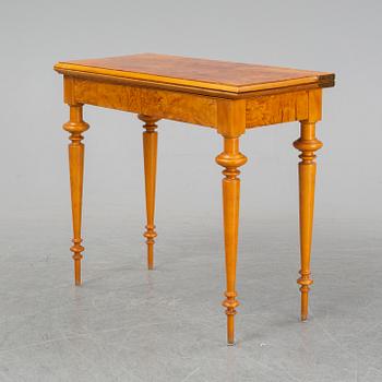 An early 20th Century birch card table.