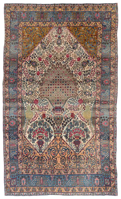 An antique Tehran carpet, north Persia, c. 323 x 195 cm.