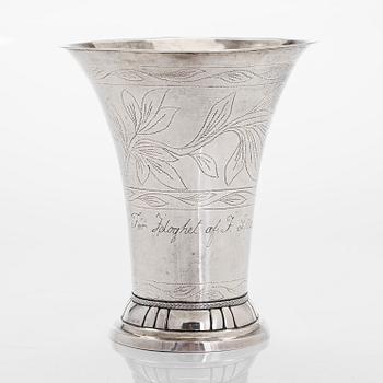 A silver beaker, maker's mark Isak Carlstedt, Porvoo ca. 1831, and silver spoon by Carl Fredrik Borgström, Turku 1803.