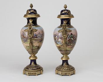 A pair of large bronze mounted vases with covers, France, second half of 19th Century.