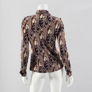 A viscose blouse by Cèline.