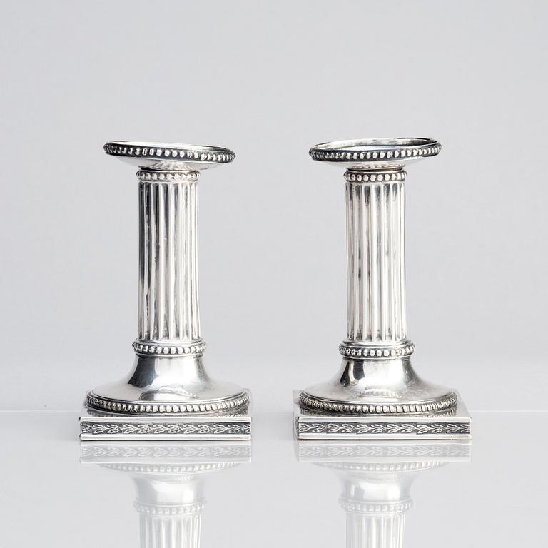 A Swedish pair of 18th century Gustavian silver candlesticks, marks of Johan Ekholm, Stockholm 1795.