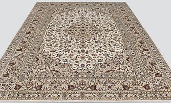 A carpet, Kashan, ca 385 x 245 cm.