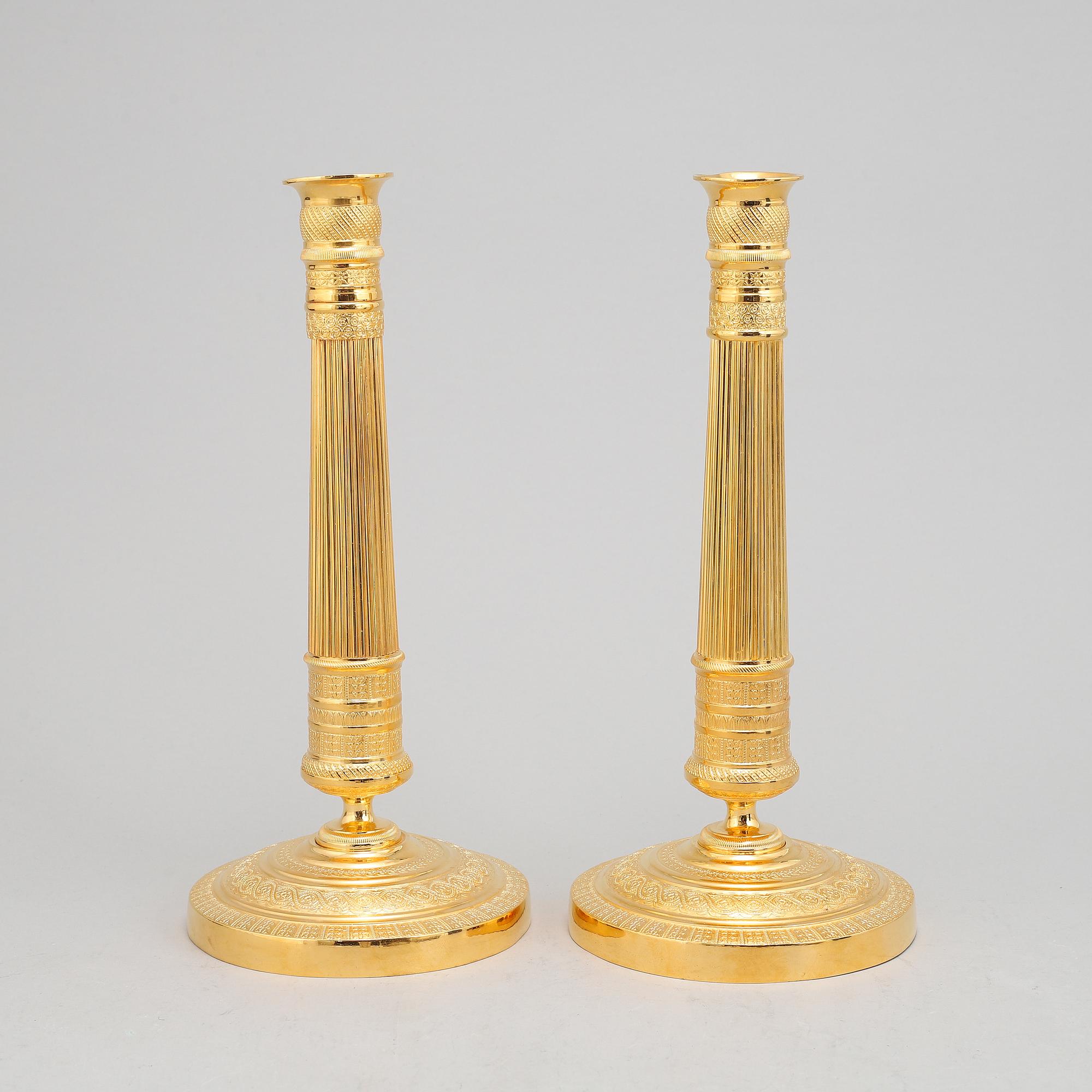 A pair of french Empire candlesticks, first half of the 19th Century.