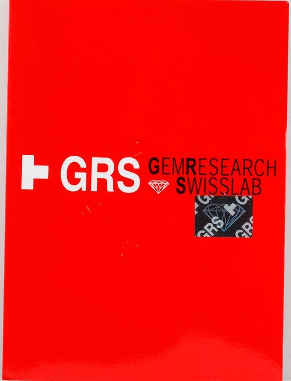 RING, 18K vitguld med naturlig cabochonslipad rubin, 16.15 ct samt små briljantslipade diamanter. Vikt 14,1 gram.