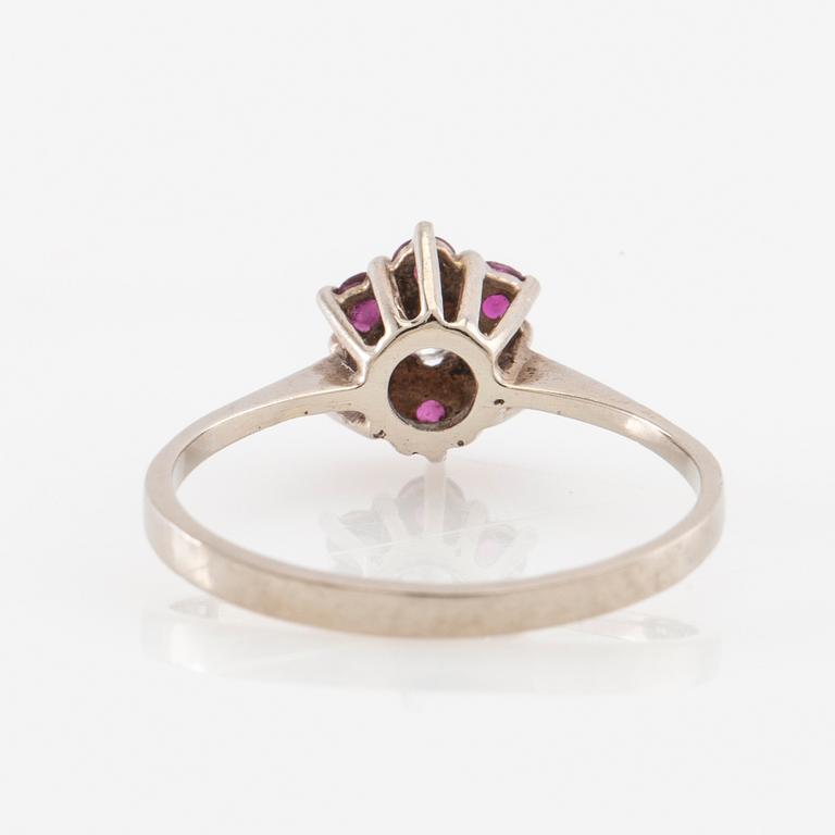 Ring 14K white gold set with a round brilliant-cut diamond and faceted rubies, Finland 1975.