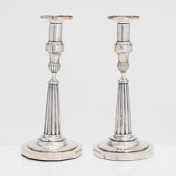 A pair of early 19th-century silver candlesticks from Berlin, maker's mark of CW.M.