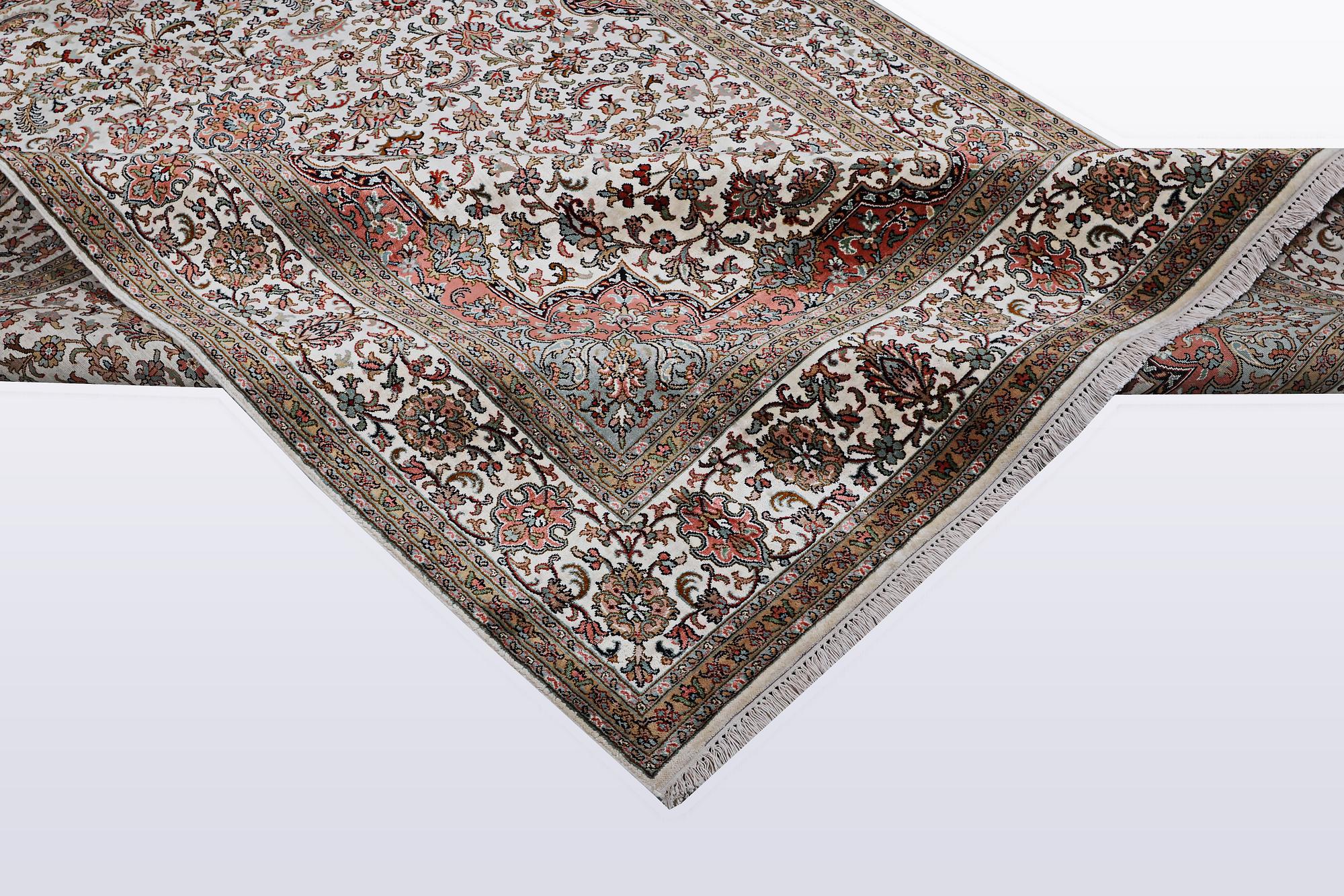 A carpet, silk Kashmir, ca 260 x 172 cm.