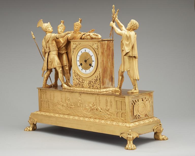 A French Empire early 19th Century gilt bronze mantel clock "Oath of the Horatii".