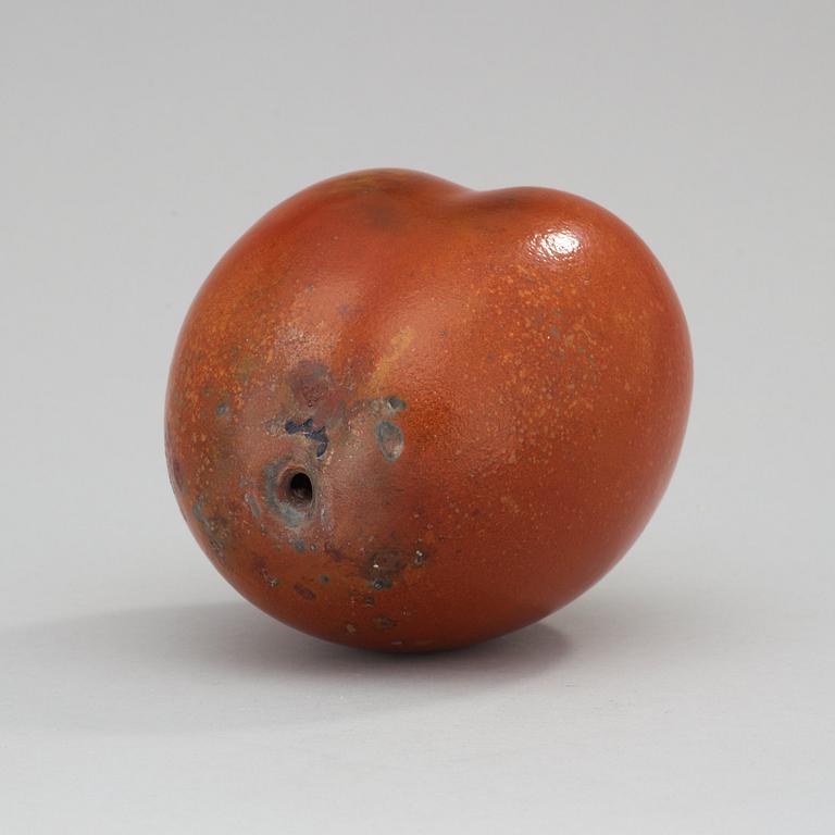 A Hans Hedberg faience sculpture of a plum, Biot, France.