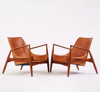 Ib Kofod Larsen, a pair of teak and cognac coloured leather "Sälen" easy chairs, Olof Perssons Fåtöljindustri (OPE), Sweden, 1950-60's.