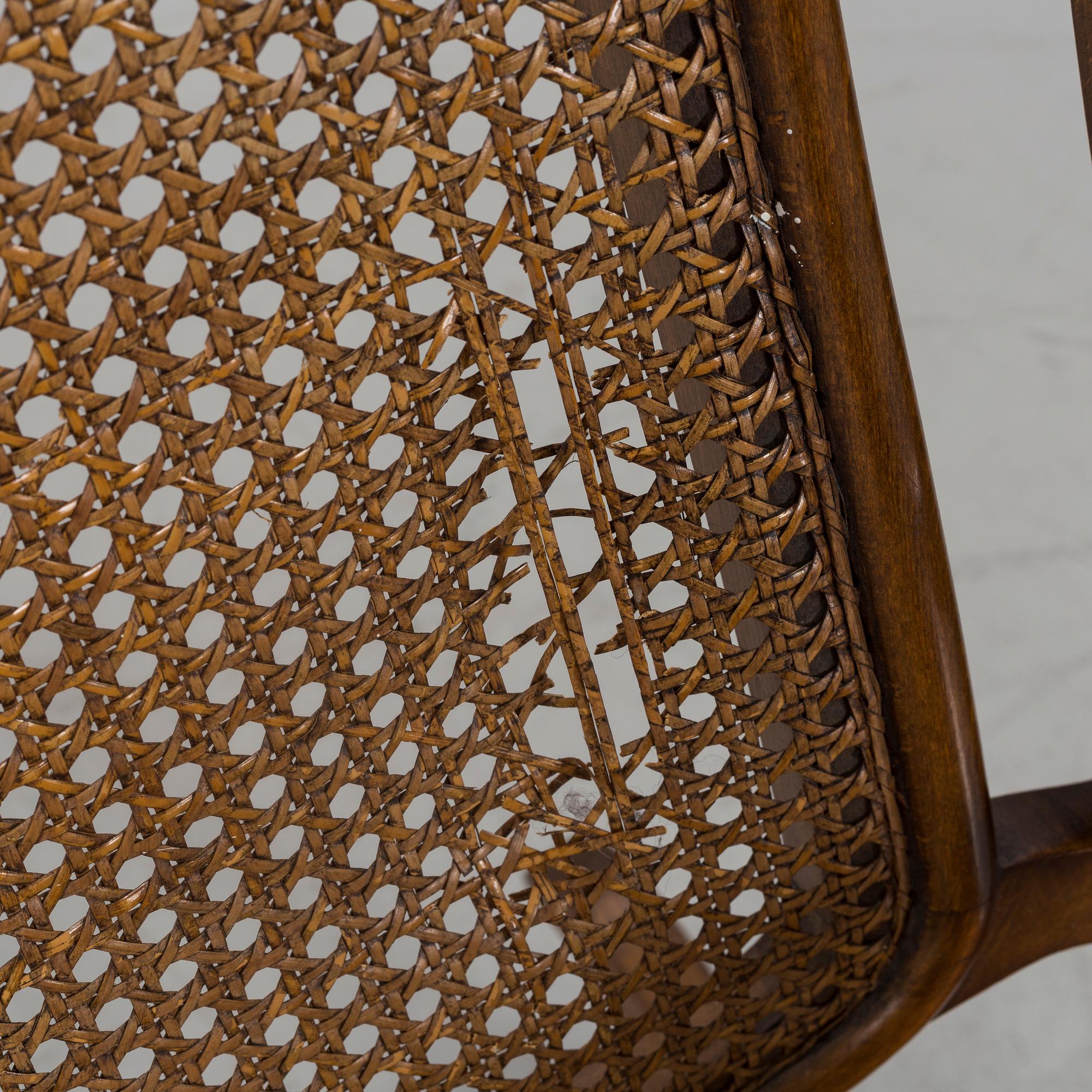 A ROCKING CHAIR LATER PART OF THE 19TH CENTURY.