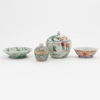 A famille rose jar with cover, box with cover and a dish and a bowl, China, circa 1900.