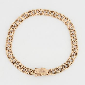 18K gold bracelet.