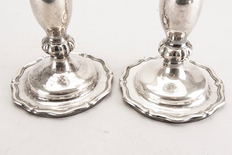 A pair of Austrian silver candle sticks Vienna 1852 weight 626 gr.