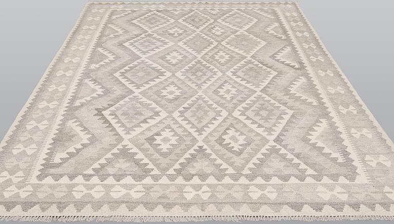 A Kilim carpet, c. 296 x 198 cm.