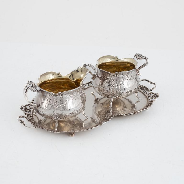 A Swedish silver coffee pot, creamer, tray and  sugar bowl, mark of GEWE, Malmö 1971-74.