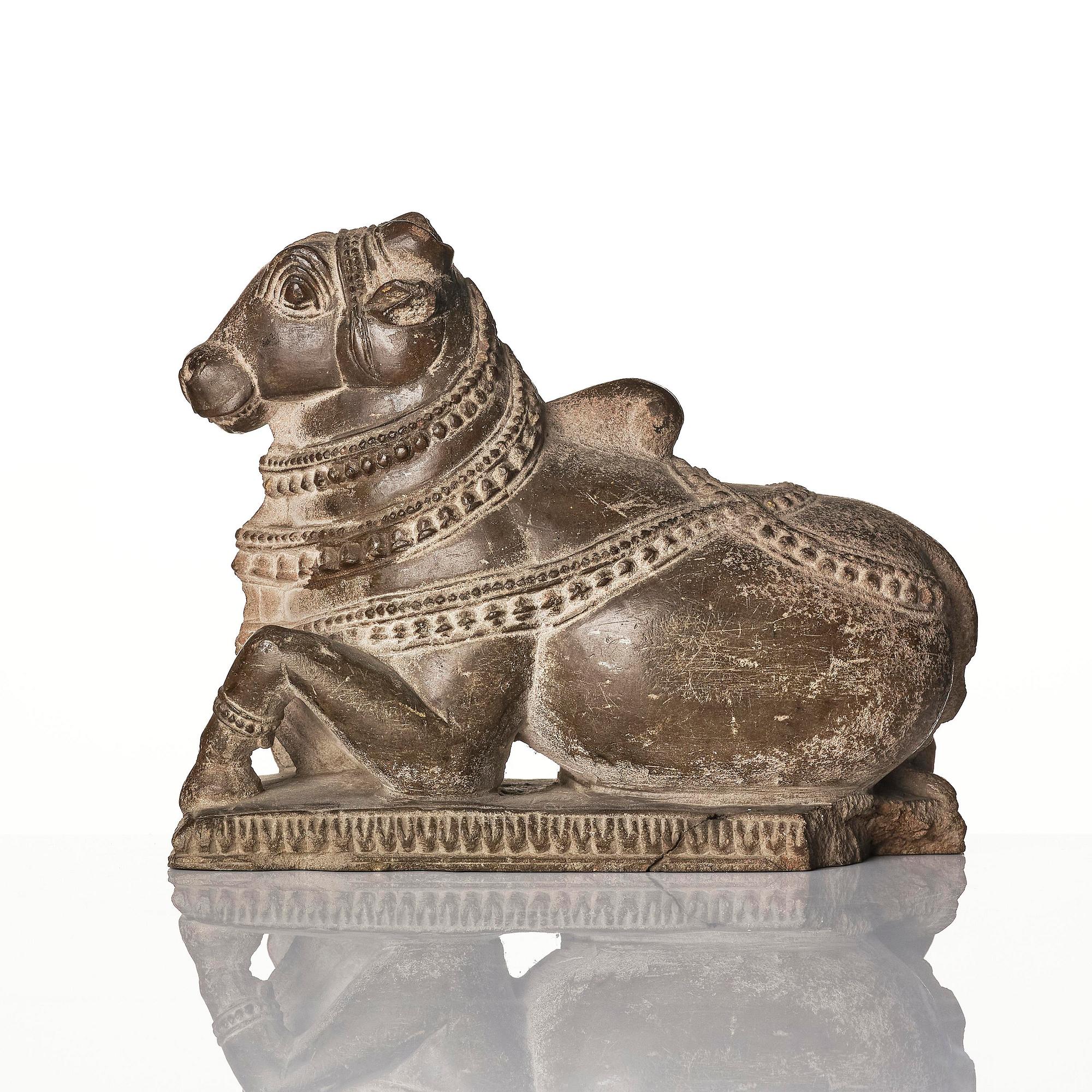 A lime stone sculpture of the bull Nandi, India, 18th/19th century or older.