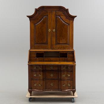 A mid 18th century rococo cabinet.