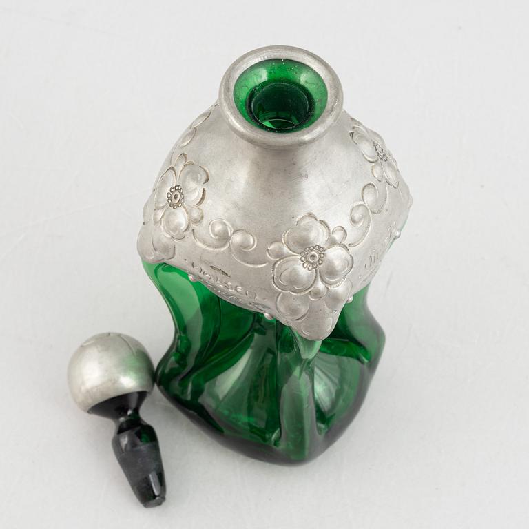 A green glass bottle with stopper, Sweden, early 20th century.