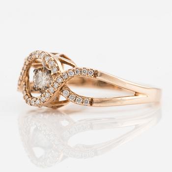 Ring, "Den dansande diamanten" med briljantslipade diamanter.