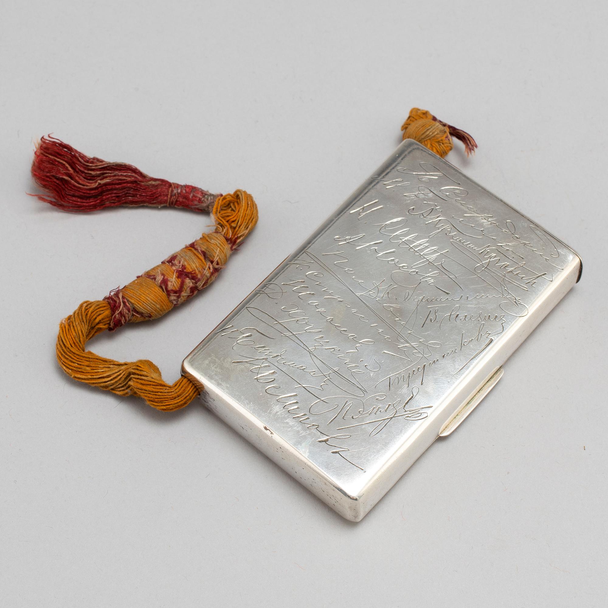 A Russian late 19th century parcel-gilt silver cigarette-case, unidentified makers mark, St. Petersburg.