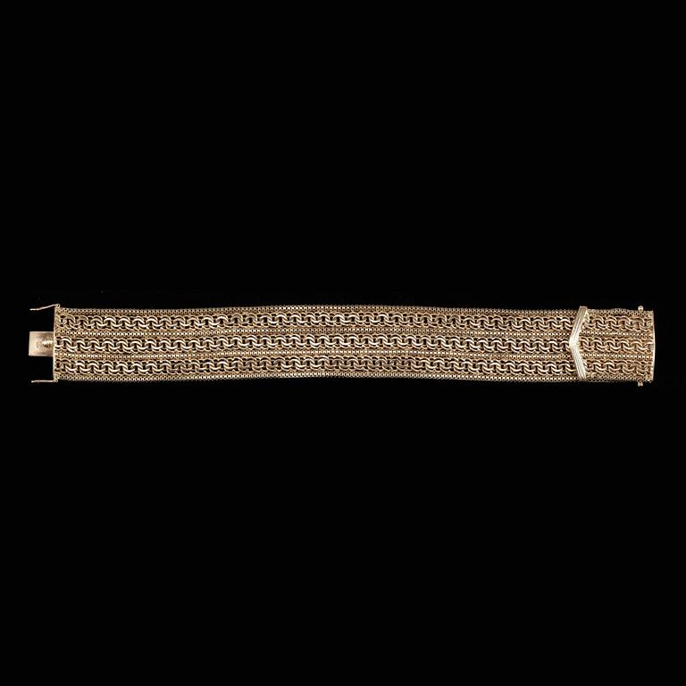 ARMLÄNK, 18k guld. Vikt ca 69 gram.