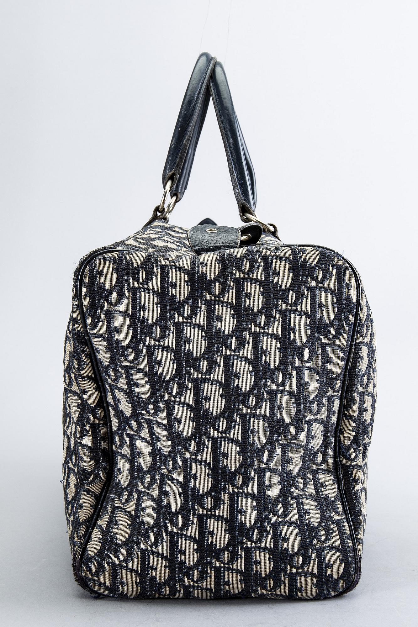 Christian Dior, two canvas handbags.